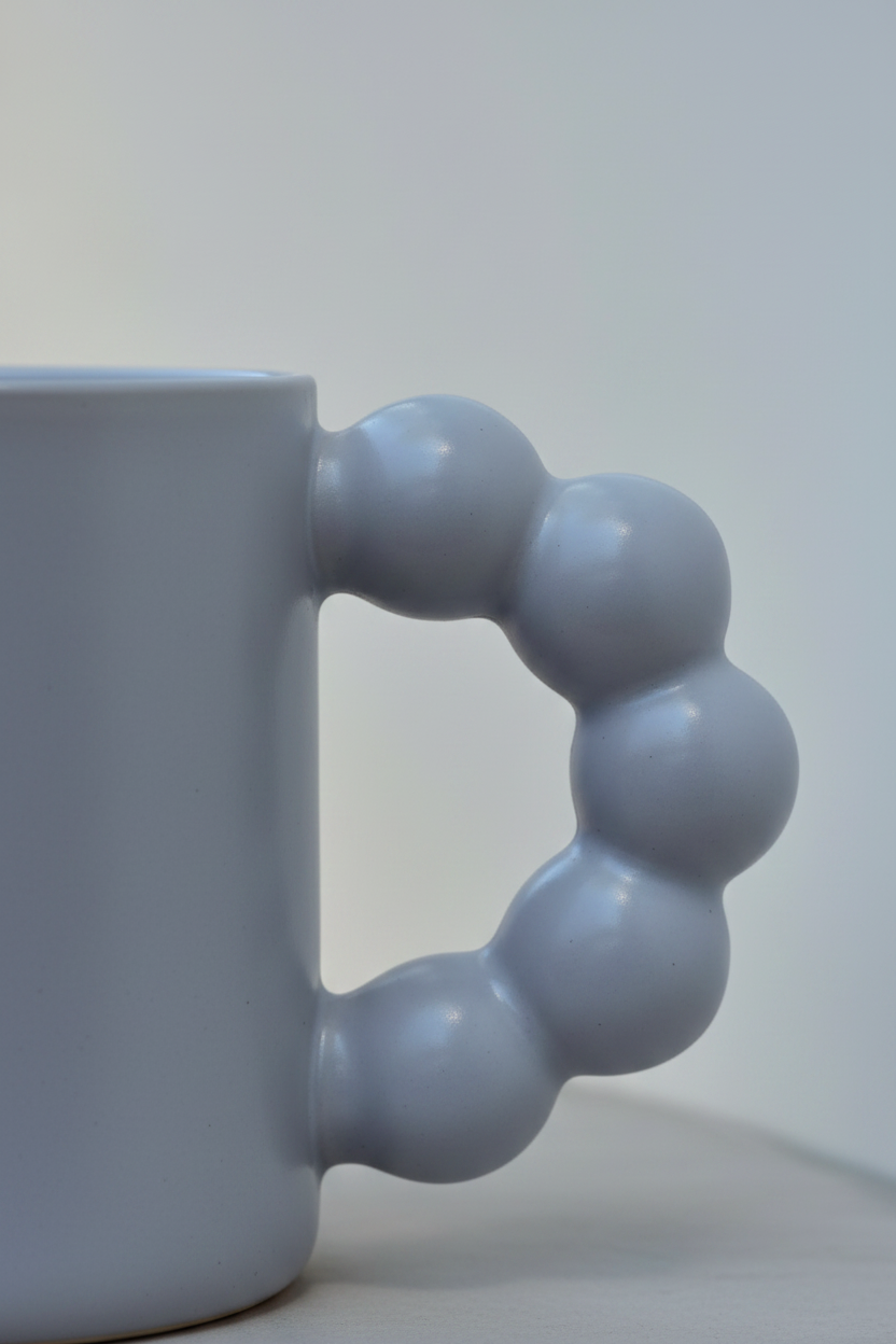 Mug gris-azul detalle asa vertical