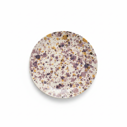 Plato splatter morado mostaza fondo blanco puro